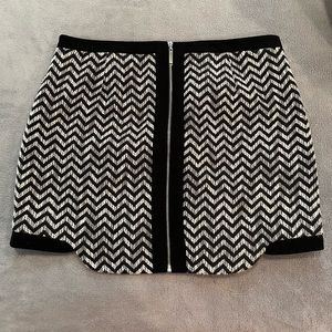 1. State- black and gray patterned mini skirt with black ribbon detail, size 4